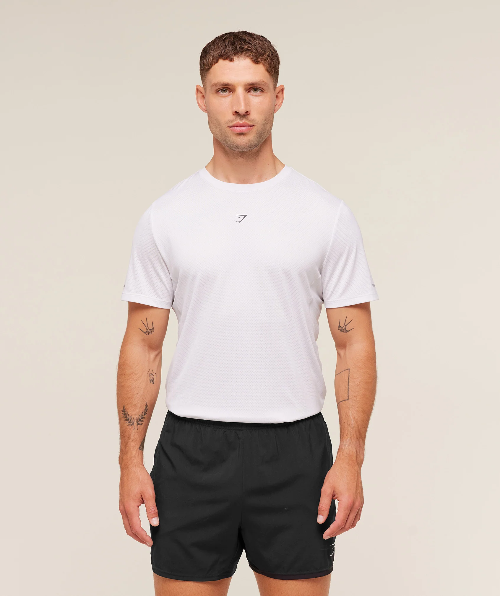 Gymshark Running T-Shirt with Sweat-Wicking Fabric and Reflective Logos