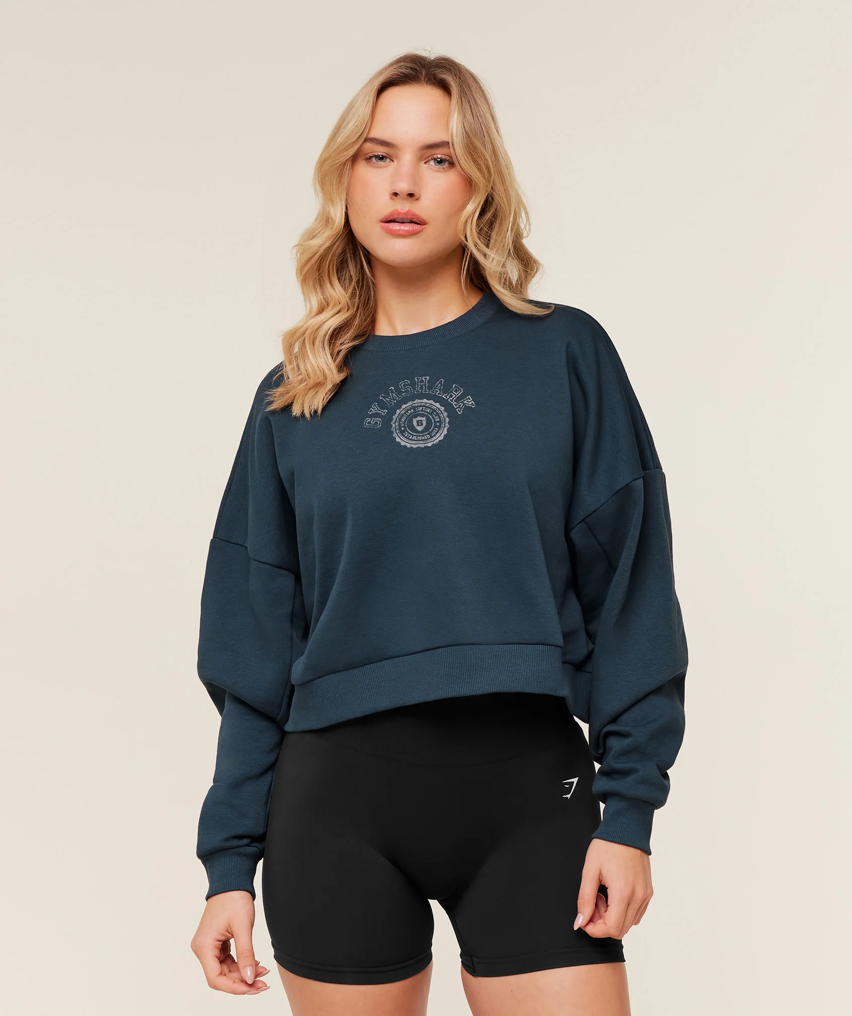 Worn Crest Graphic Sweatshirt with Dropped Shoulder and Boxy Fit