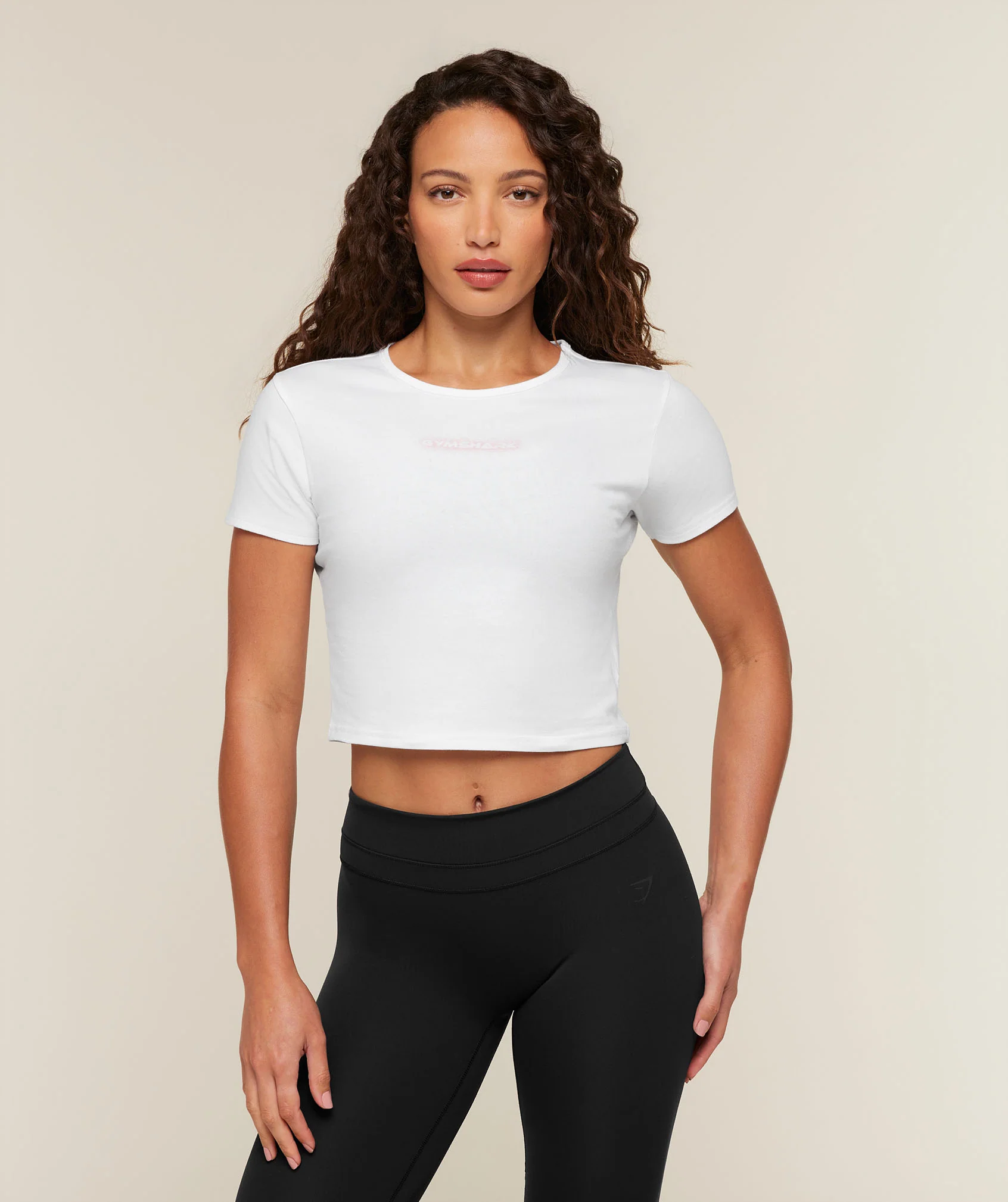 Gymshark For The Ones Who Show Up Graphic Baby Tee in Washed Fabric