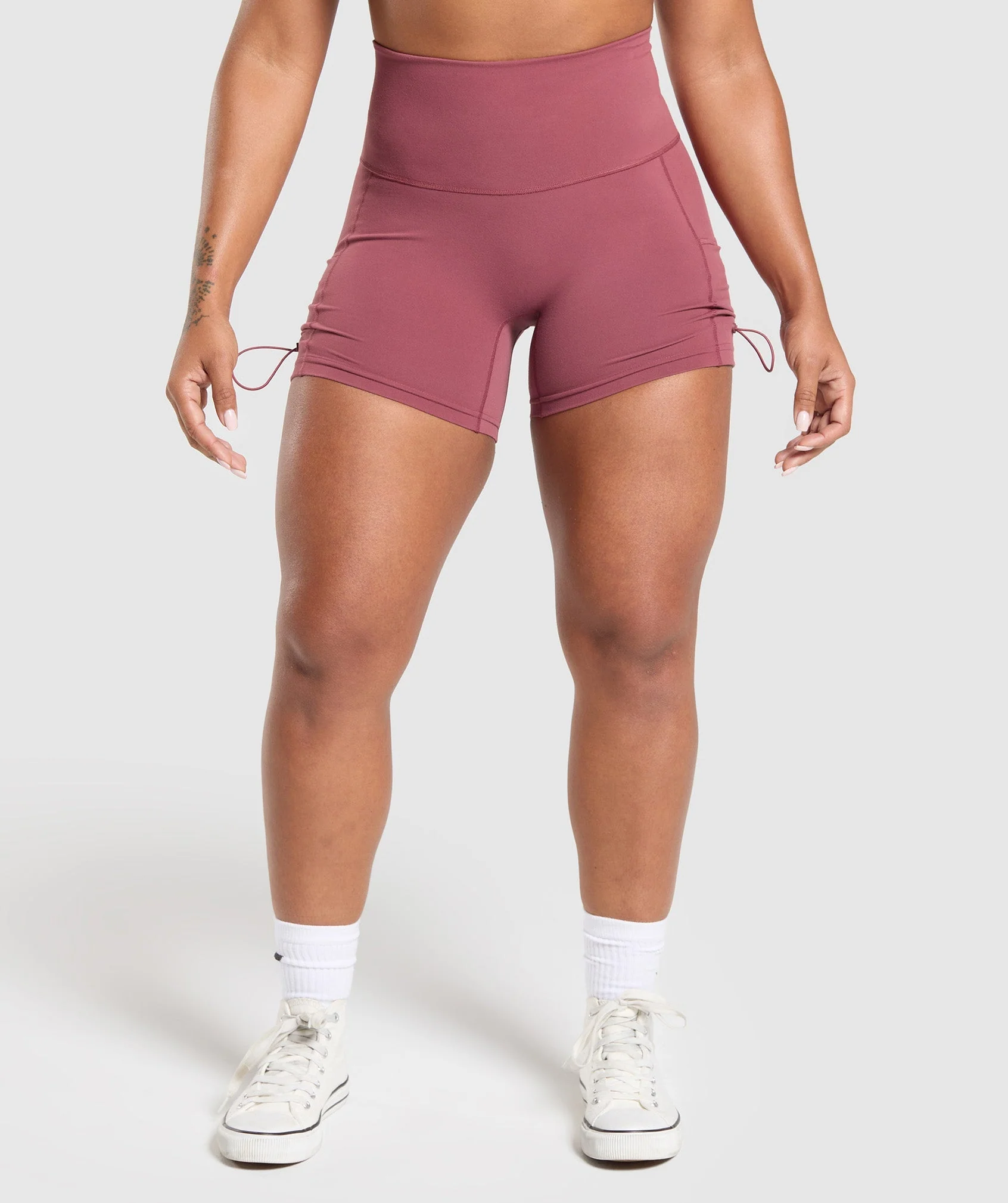 Gymshark Legacy Logo Tight Shorts in Washed Berry Pink