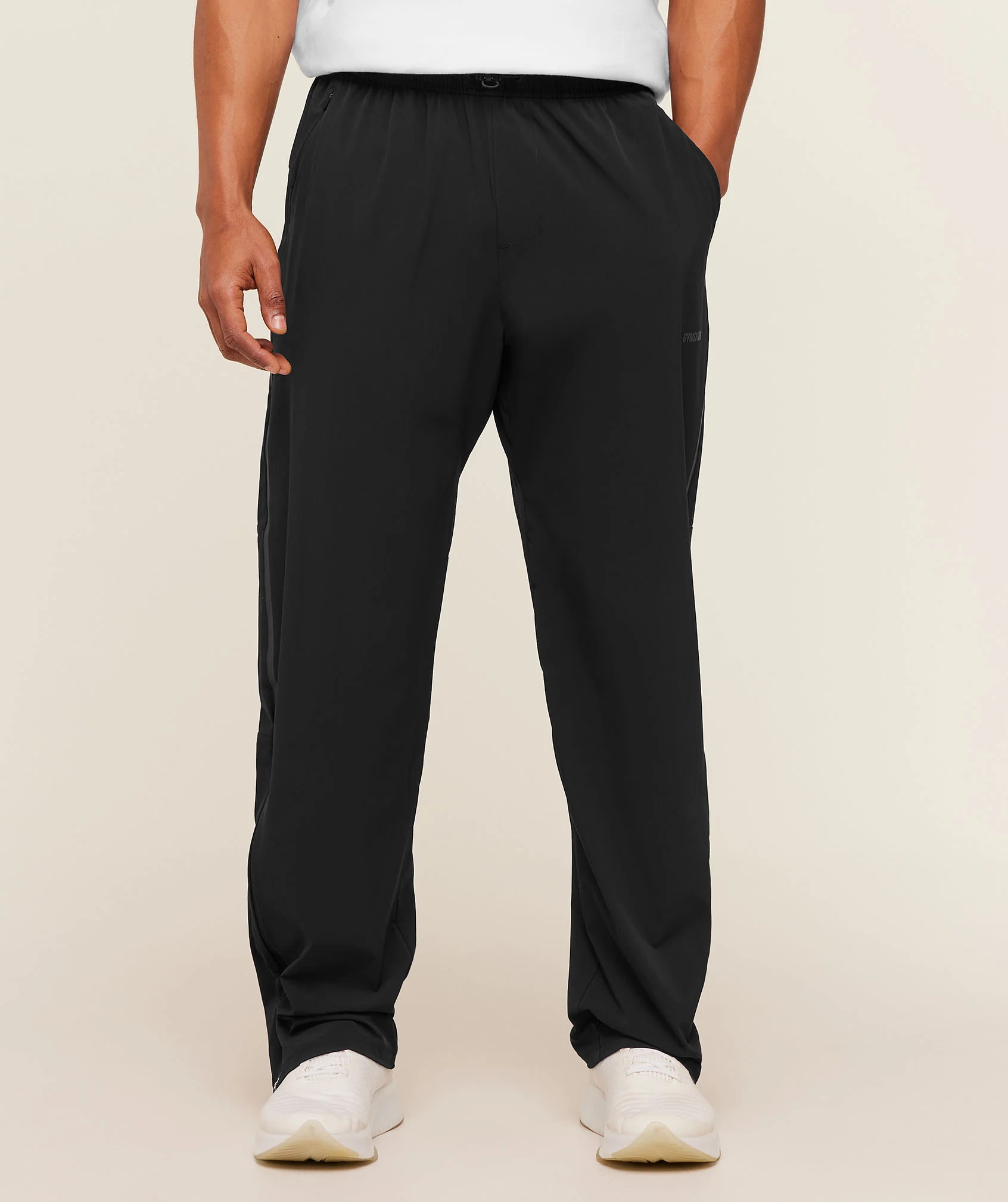 Pantalon d'entraînement hybride zip en nylon coupe slim