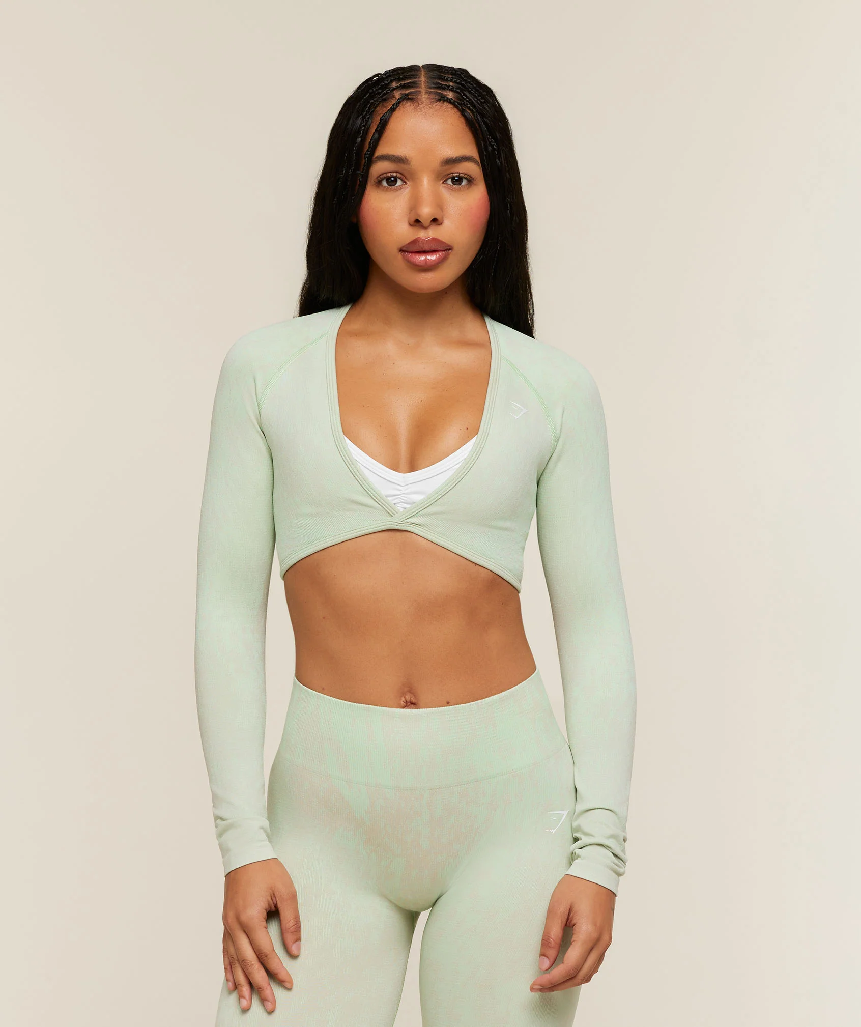 Adapt Animal x Whitney Long Sleeve Crop Top in Snow Leopard Print