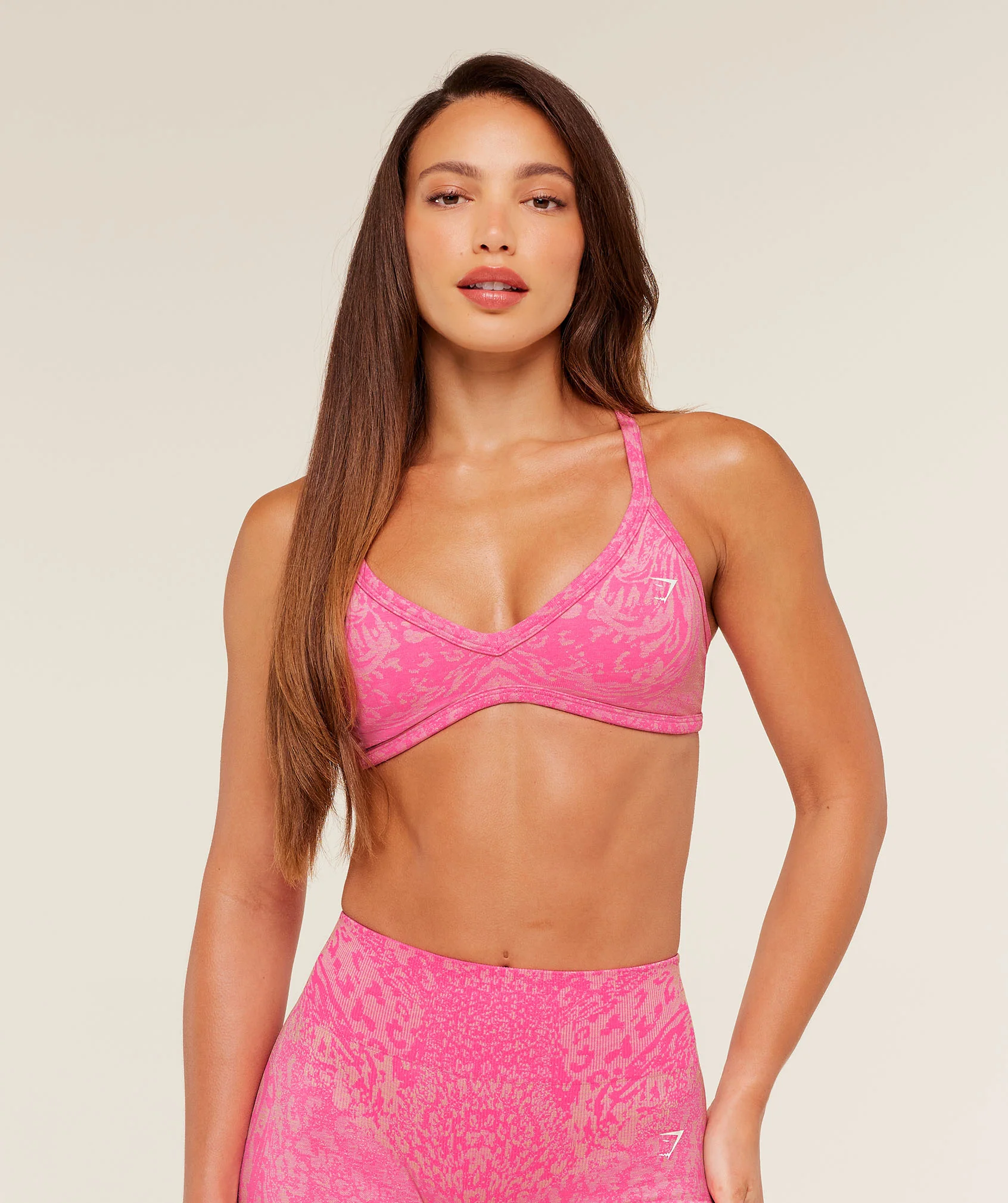 Adapt Animal Sports Bra with Cheetah Print and Low V Neck