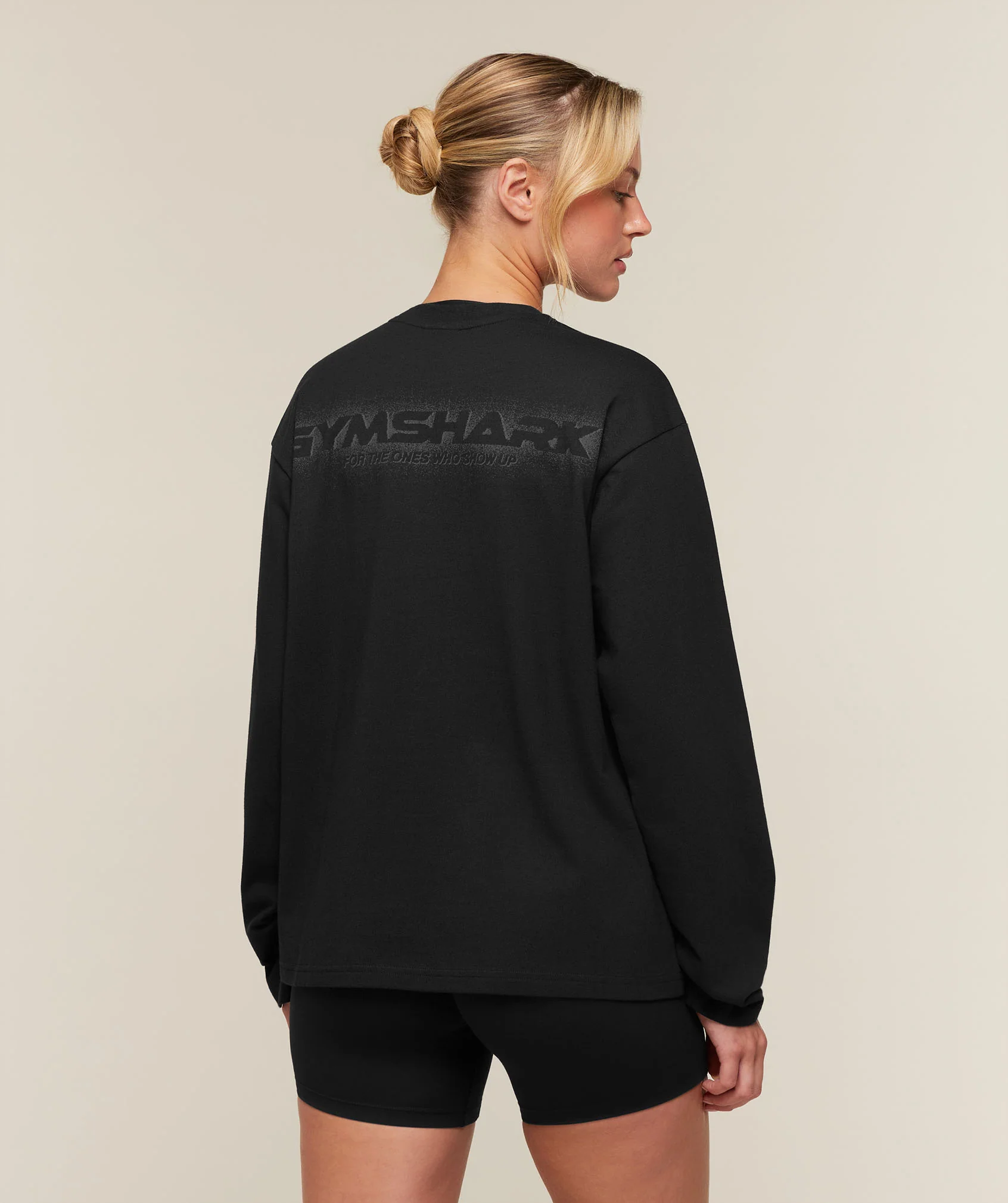 Gymshark For The Ones Who Show Up Graphic Long Sleeve Top in Black